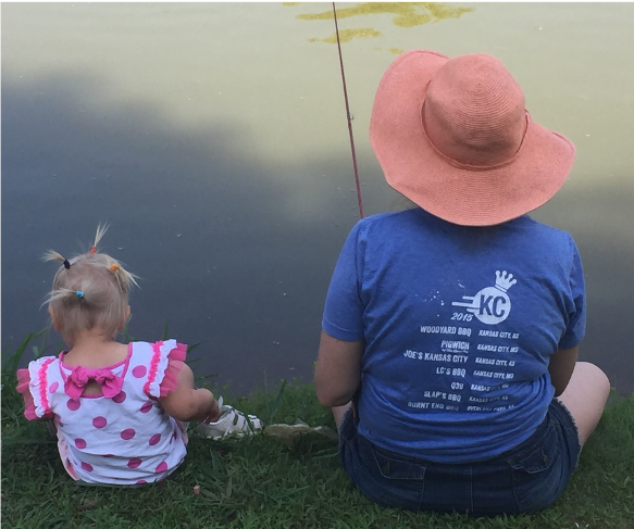 Mom fishing with daughter